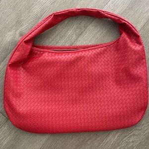 Red faux leather bag